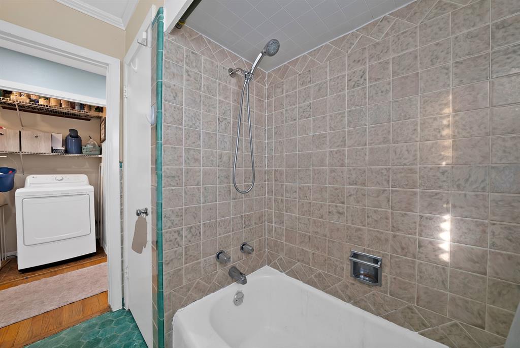 5705 Blue Ridge Drive Fort Worth, TX 76112 - Photo 38 of 40 a bathroom with a sink a toilet and shower