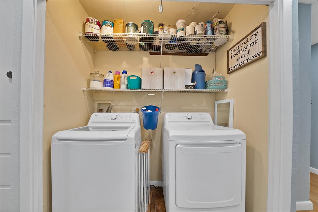 5705 Blue Ridge Drive Fort Worth, TX 76112 - Photo 39 of 40 a utility room with dryer and washer