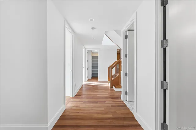a bedroom with a large bed and a large window with outer view
