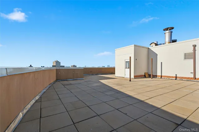 a view of hallway with closet