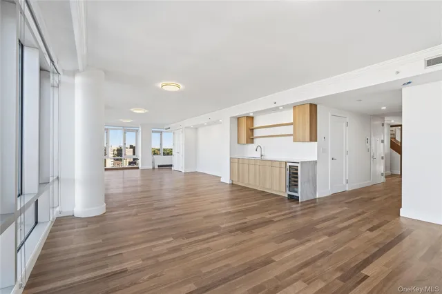 a view of a livingroom with wooden floor