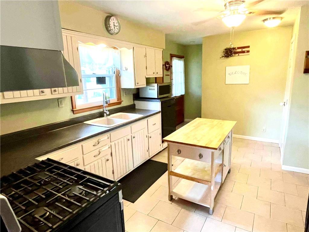 2515 Warren Road Indiana, PA 15701 - Photo 6 of 25 a kitchen with a sink and a stove