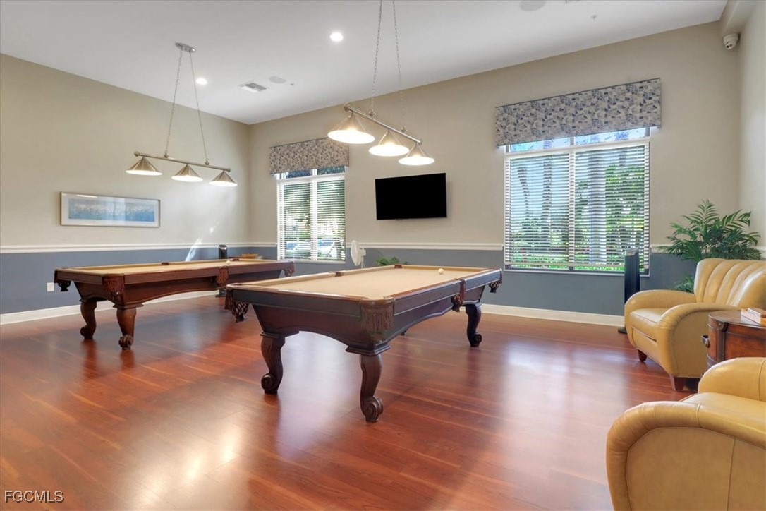 19674 Villa Rosa Loop Estero, FL 33967 - Photo 27 of 33 a living room with furniture pool table and a flat screen tv