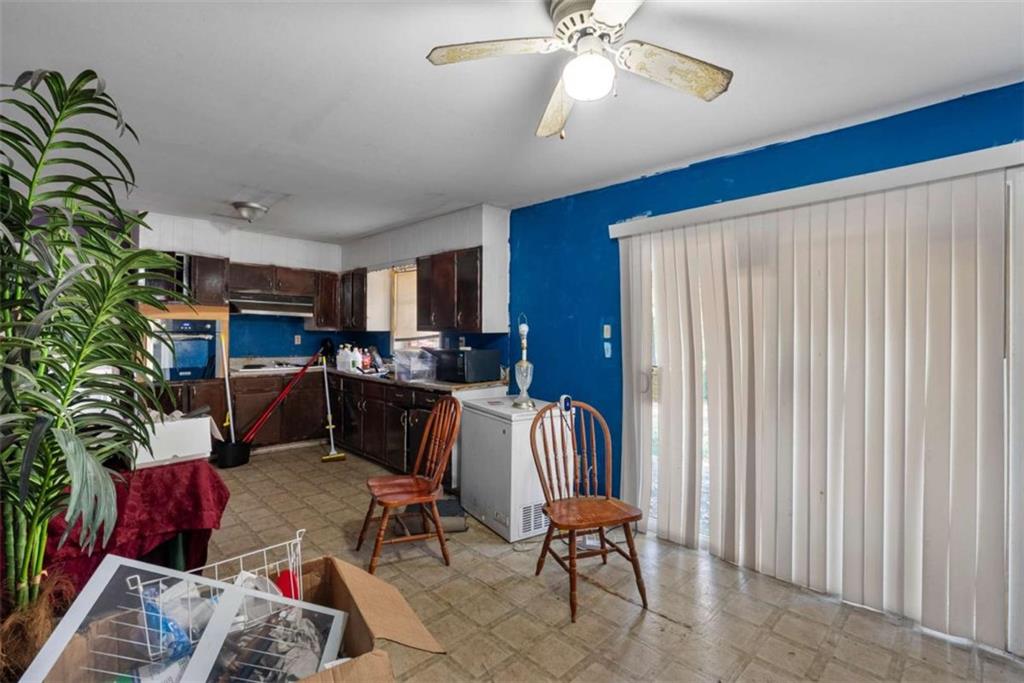 2390 Mellville Avenue Decatur, GA 30032 - Photo 12 of 26 a living room with furniture and a potted plant