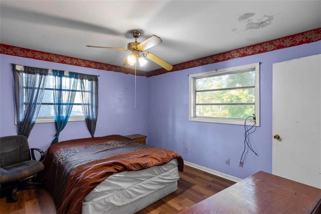 2390 Mellville Avenue Decatur, GA 30032 - Photo 17 of 26 a bedroom with a bed and a window