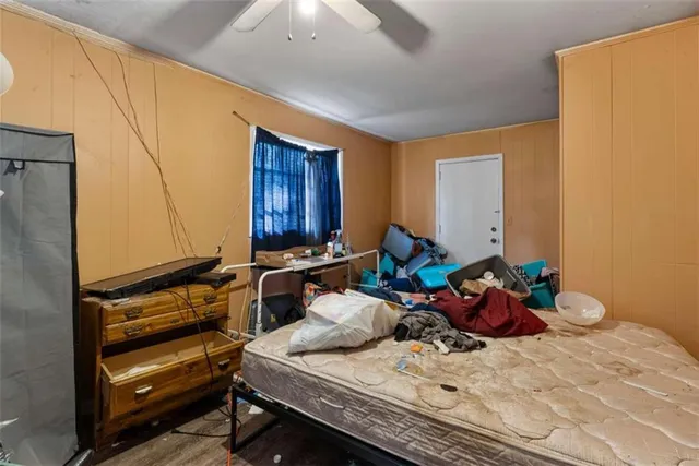 a room with furniture and a flat screen tv