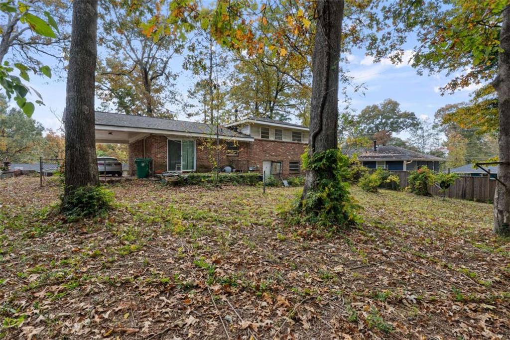 2390 Mellville Avenue Decatur, GA 30032 - Photo 5 of 26 front view of a house with a yard