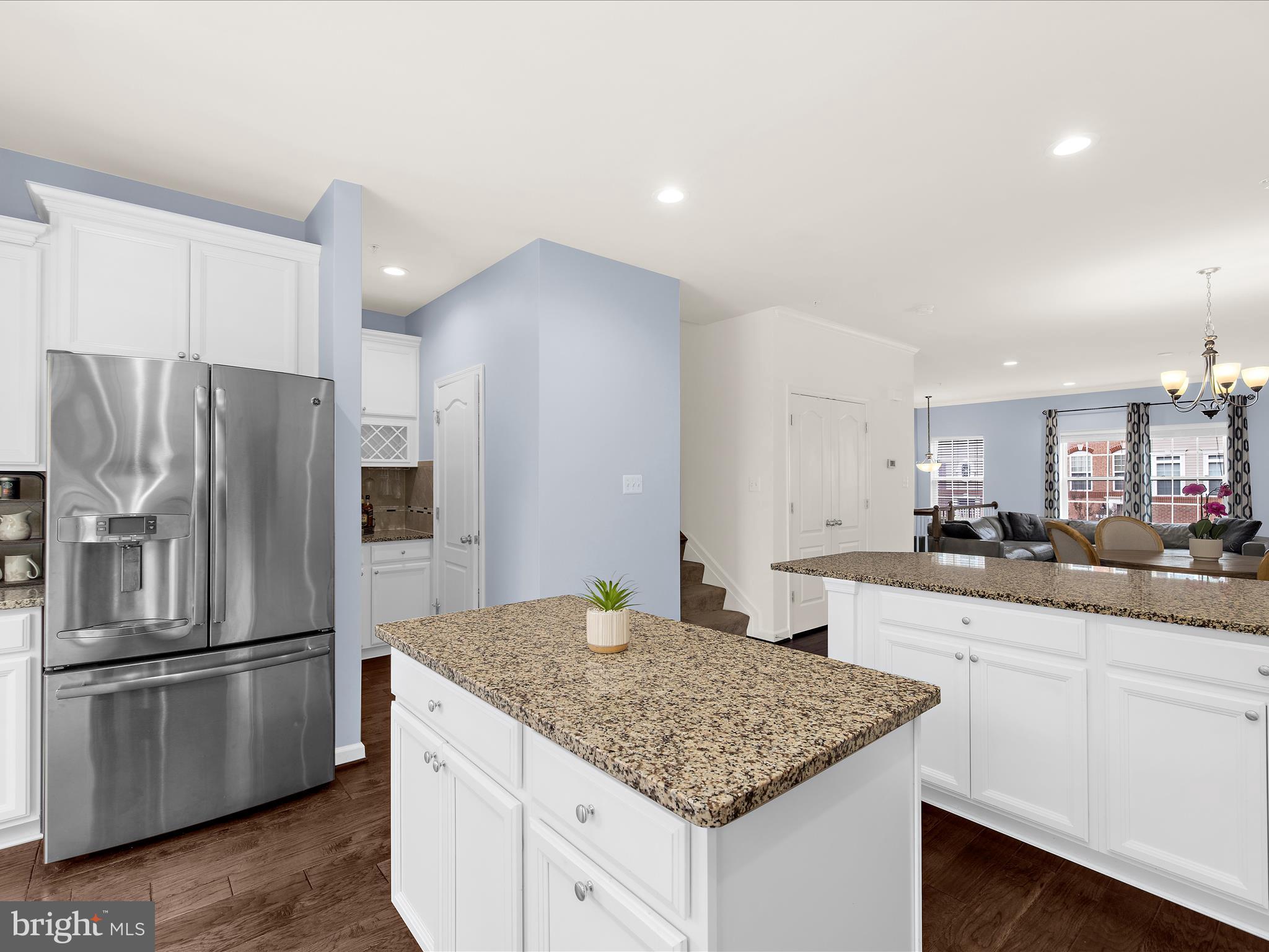 1008 Red Clover Road Gambrills, MD 21054 - Photo 12 of 51 a kitchen with stainless steel appliances granite countertop a sink stove and refrigerator