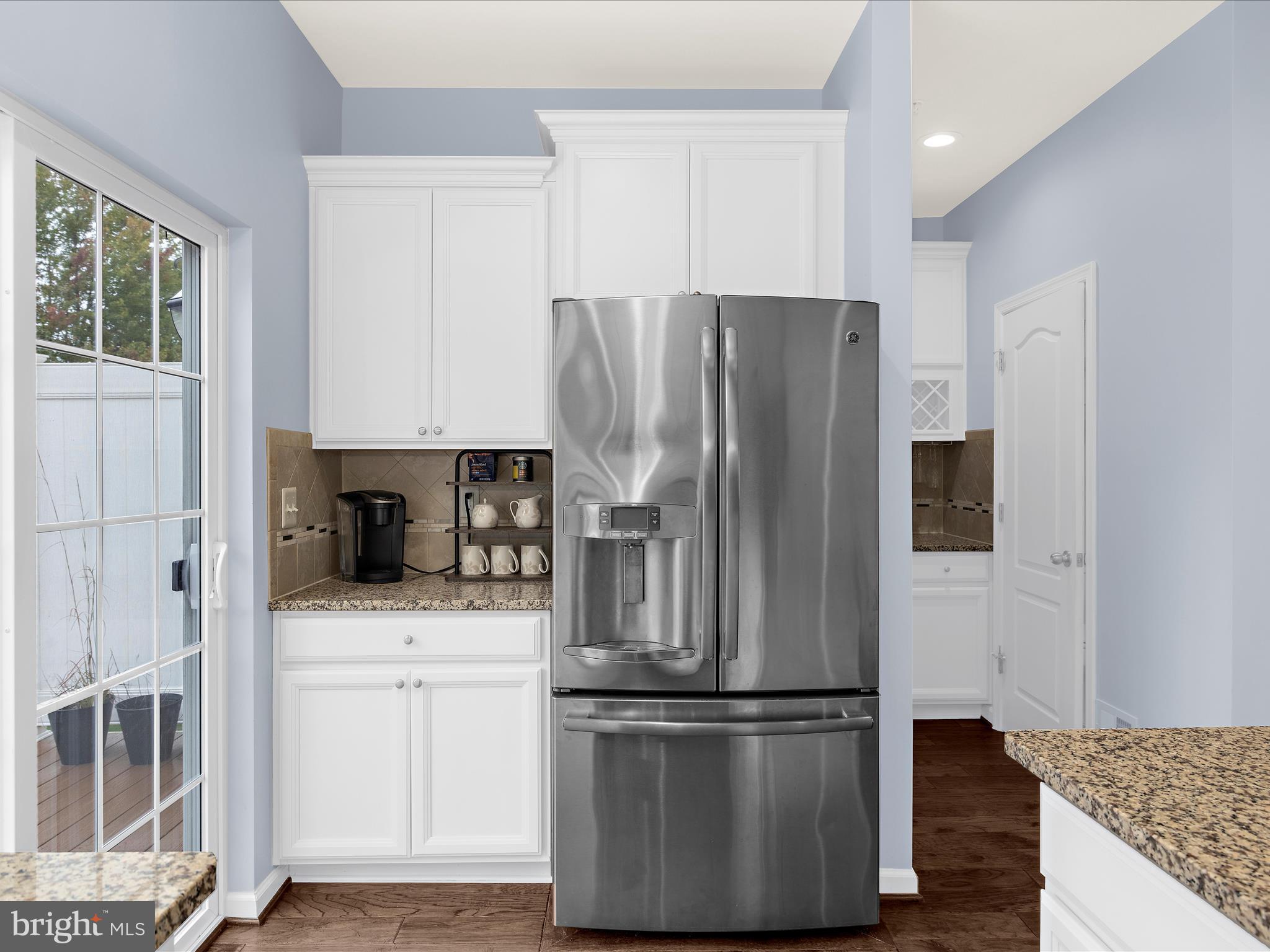 1008 Red Clover Road Gambrills, MD 21054 - Photo 15 of 51 a kitchen with stainless steel appliances granite countertop a refrigerator and a stove top oven