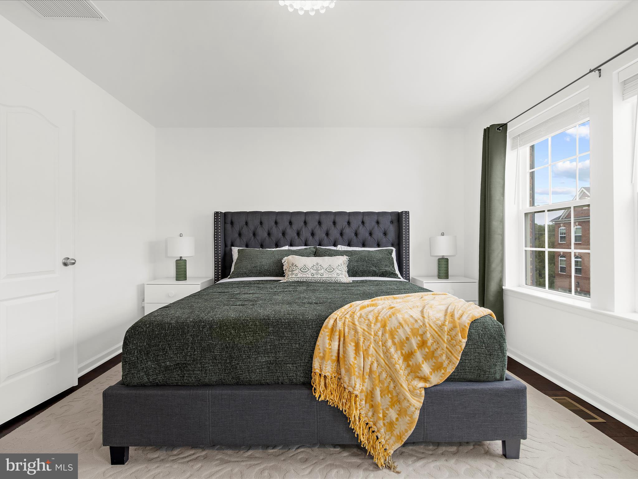 1008 Red Clover Road Gambrills, MD 21054 - Photo 21 of 51 a bedroom with a bed and wooden floor