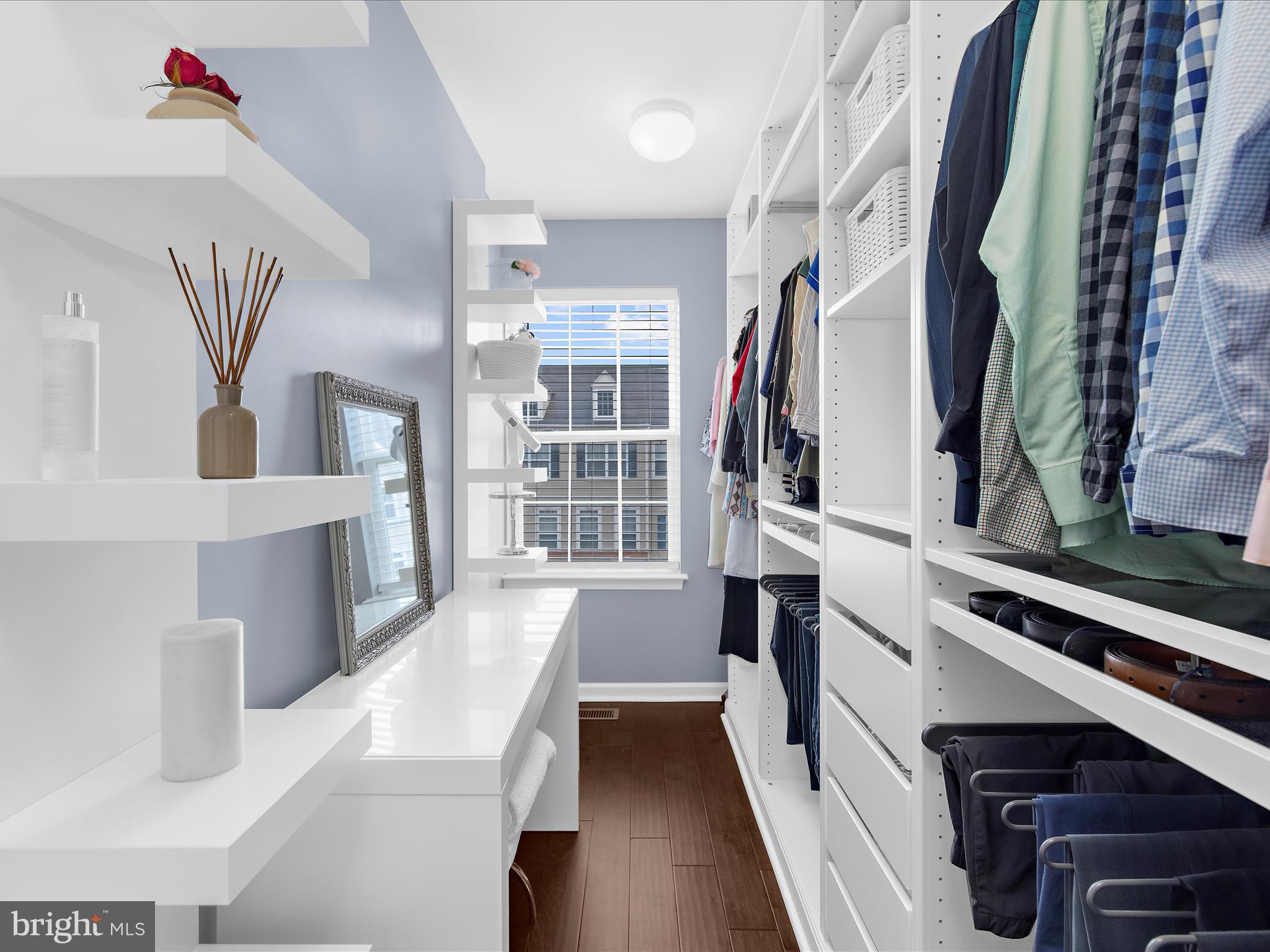 1008 Red Clover Road Gambrills, MD 21054 - Photo 24 of 51 a view of walk in closet with clothes and shoes