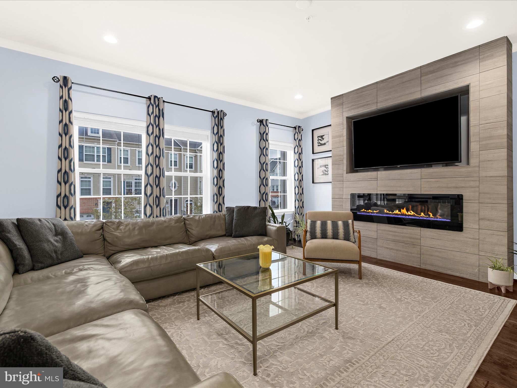 1008 Red Clover Road Gambrills, MD 21054 - Photo 3 of 51 a living room with furniture and a flat screen tv