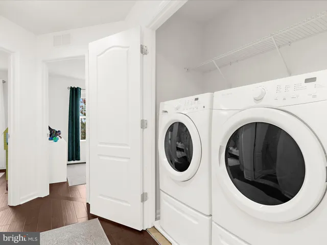 a view of livingroom with furniture and workspace