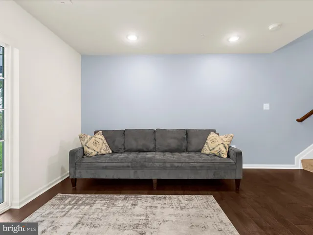 a view of balcony with wooden floor and fence