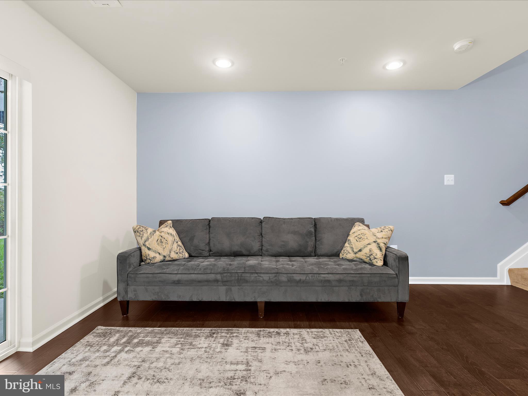 1008 Red Clover Road Gambrills, MD 21054 - Photo 45 of 51 a living room with a couch and a wooden floor