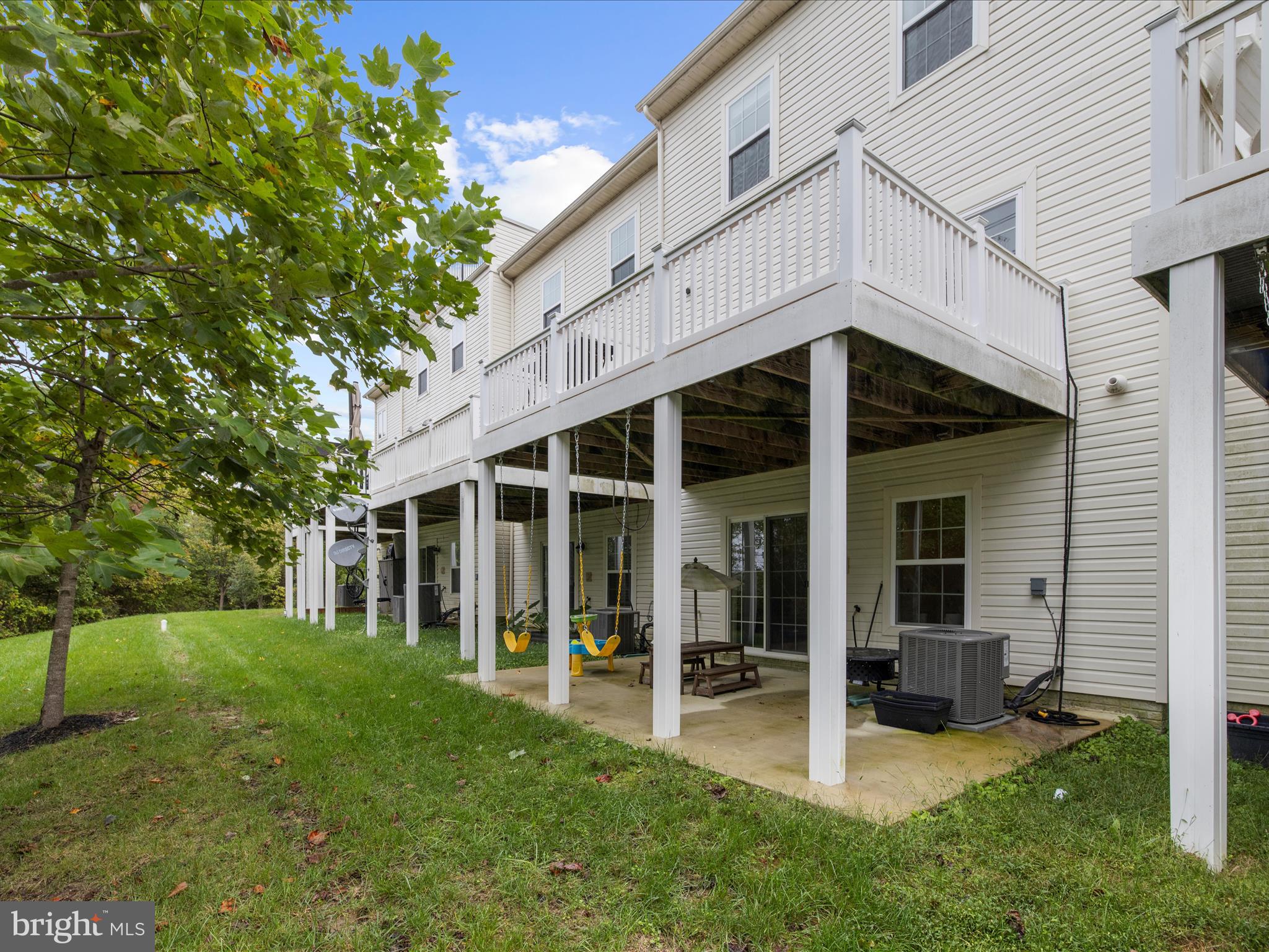 1008 Red Clover Road Gambrills, MD 21054 - Photo 48 of 51 a view of a house with backyard porch and garden