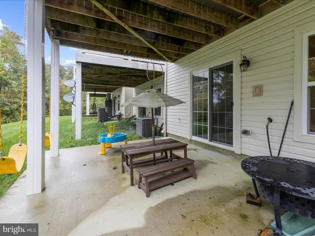 a garden view with a seating space