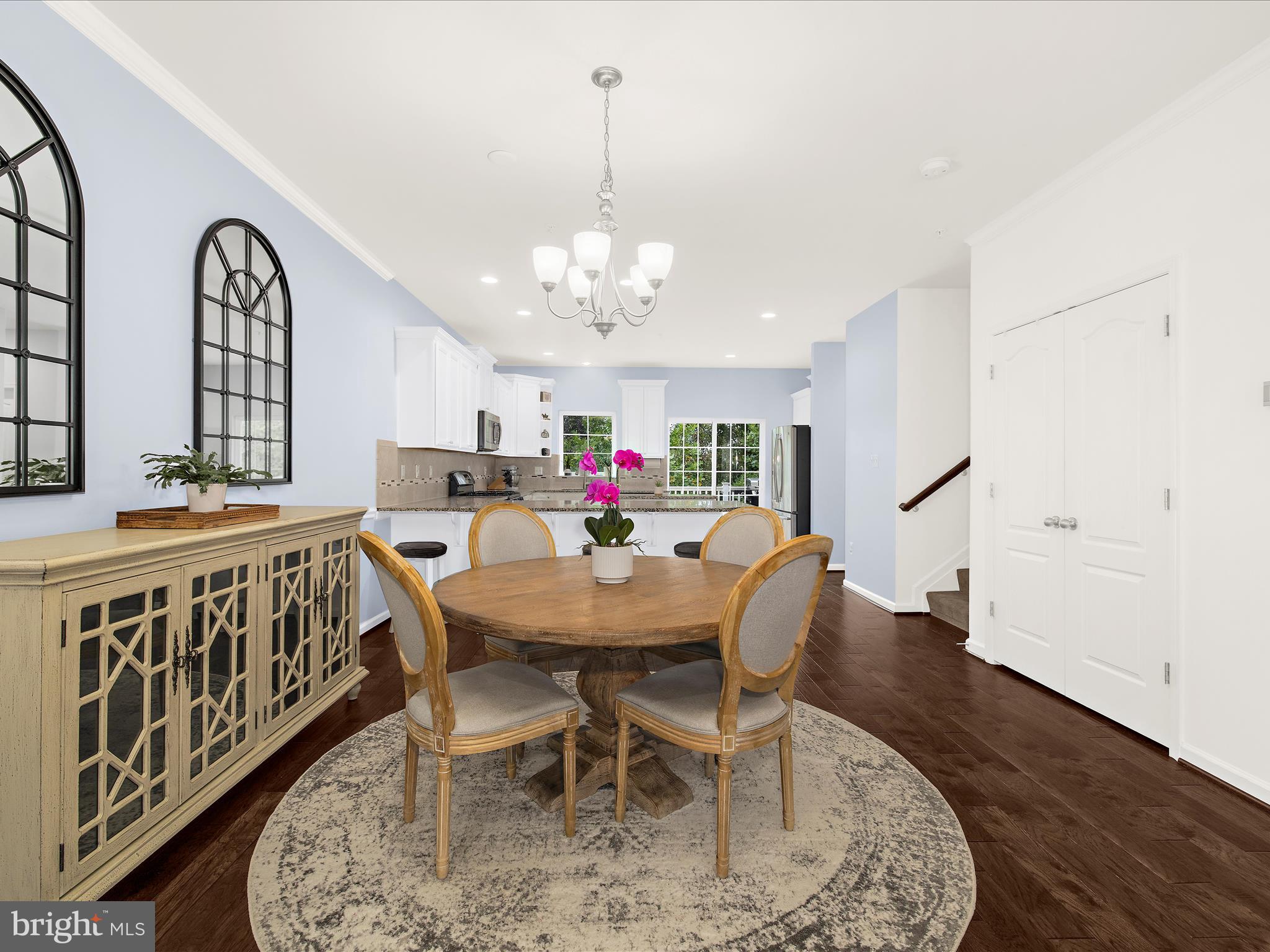 1008 Red Clover Road Gambrills, MD 21054 - Photo 7 of 51 a view of a a dining room with furniture window and wooden floor