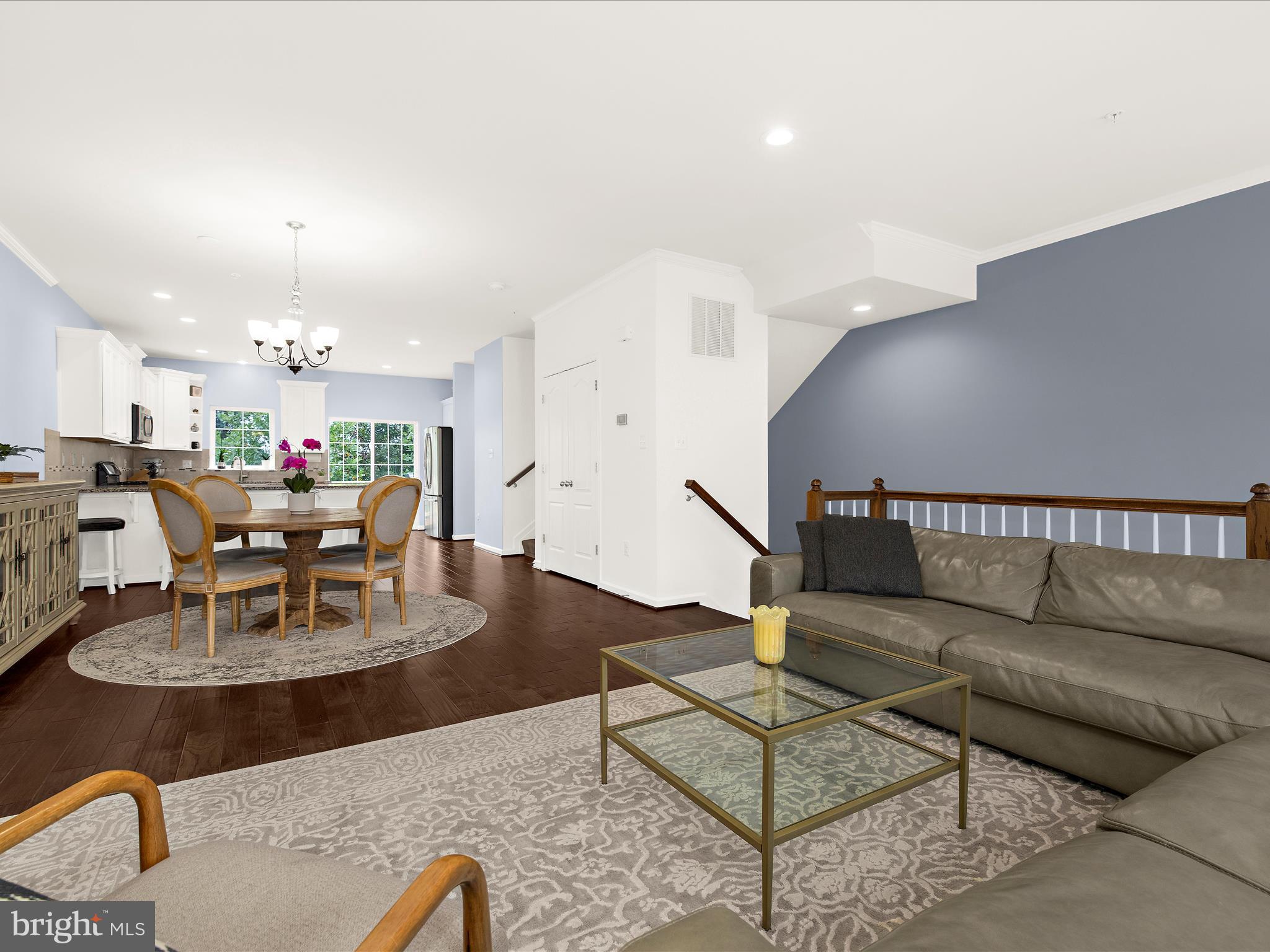 1008 Red Clover Road Gambrills, MD 21054 - Photo 10 of 51 a living room with furniture kitchen view and a dining table