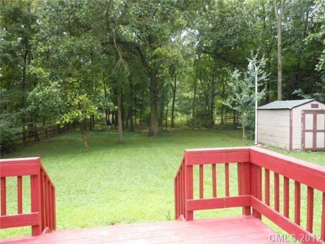 14521 Cinnamon Field Road Charlotte, NC 28273 - Photo 14 of 14 a view of an outdoor space and deck