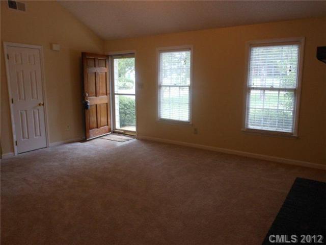 14521 Cinnamon Field Road Charlotte, NC 28273 - Photo 4 of 14 an empty room with windows