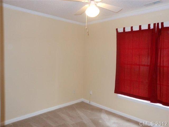 14521 Cinnamon Field Road Charlotte, NC 28273 - Photo 5 of 14 a view of a small space with wooden floor and a window