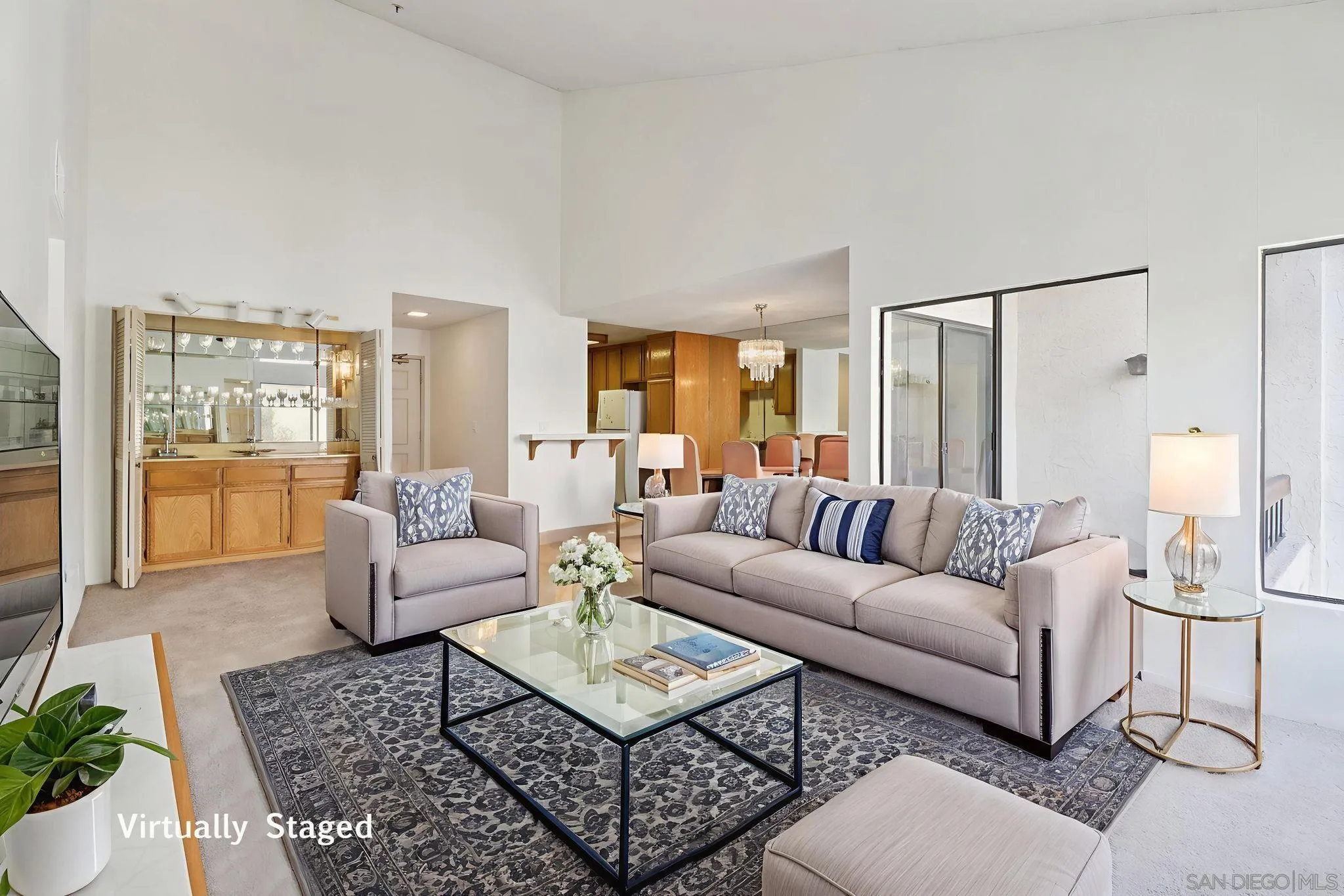 5645 Friars Road, Unit 386 San Diego, CA 92110 - Photo 1 of 45 a living room with furniture a rug and a table