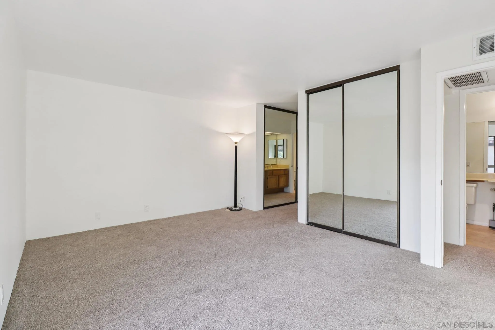 5645 Friars Road, Unit 386 San Diego, CA 92110 - Photo 17 of 45 an empty room with closet and a bathroom view
