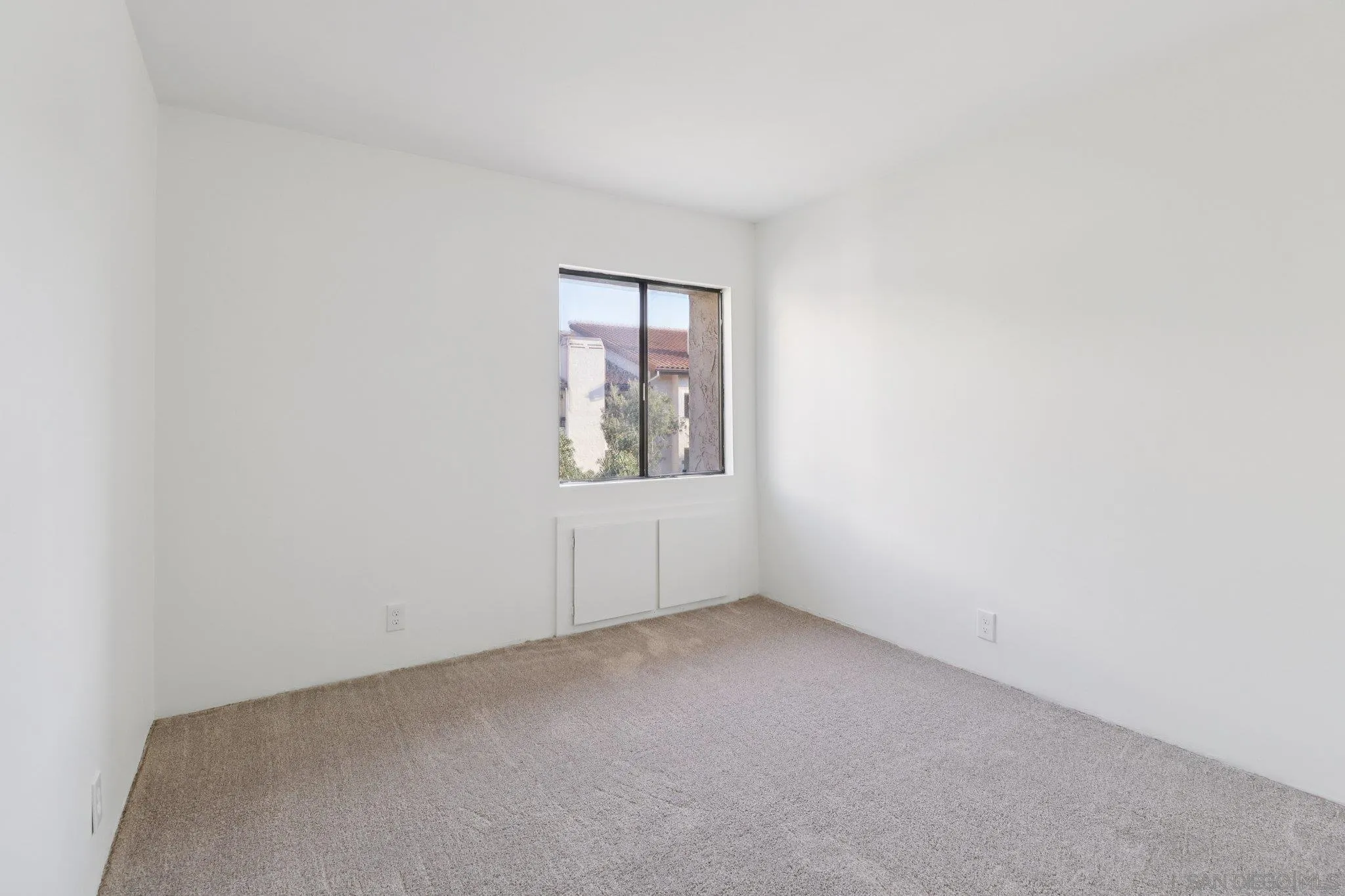 5645 Friars Road, Unit 386 San Diego, CA 92110 - Photo 22 of 45 an empty room with a window
