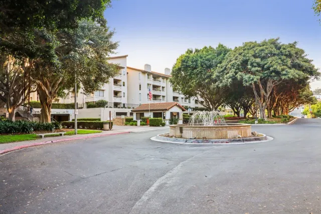 a front view of a building with street view