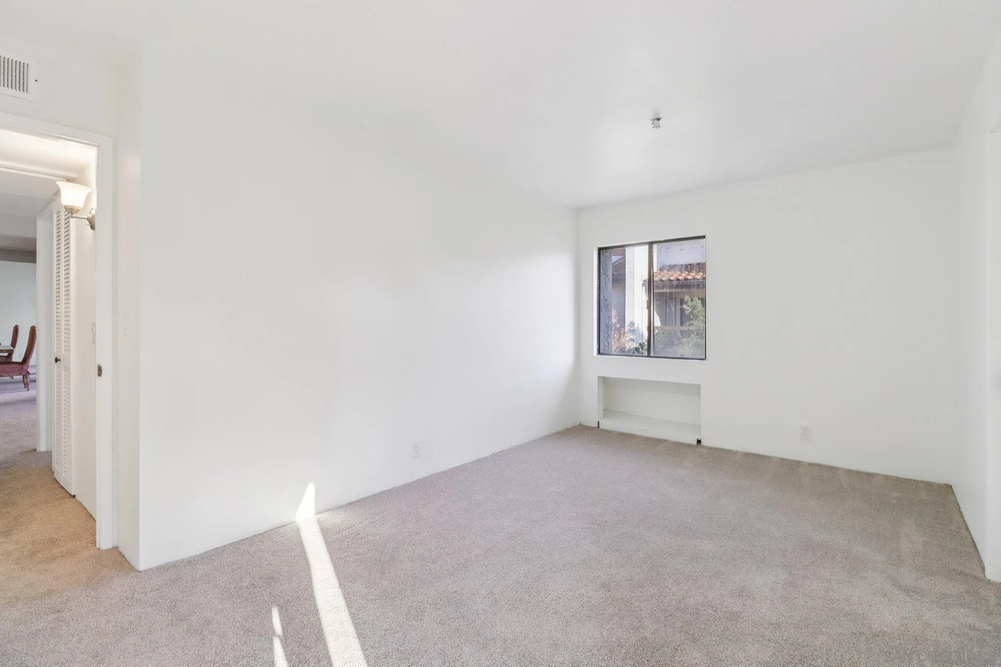 5645 Friars Road, Unit 386 San Diego, CA 92110 - Photo 27 of 45 an empty room with windows