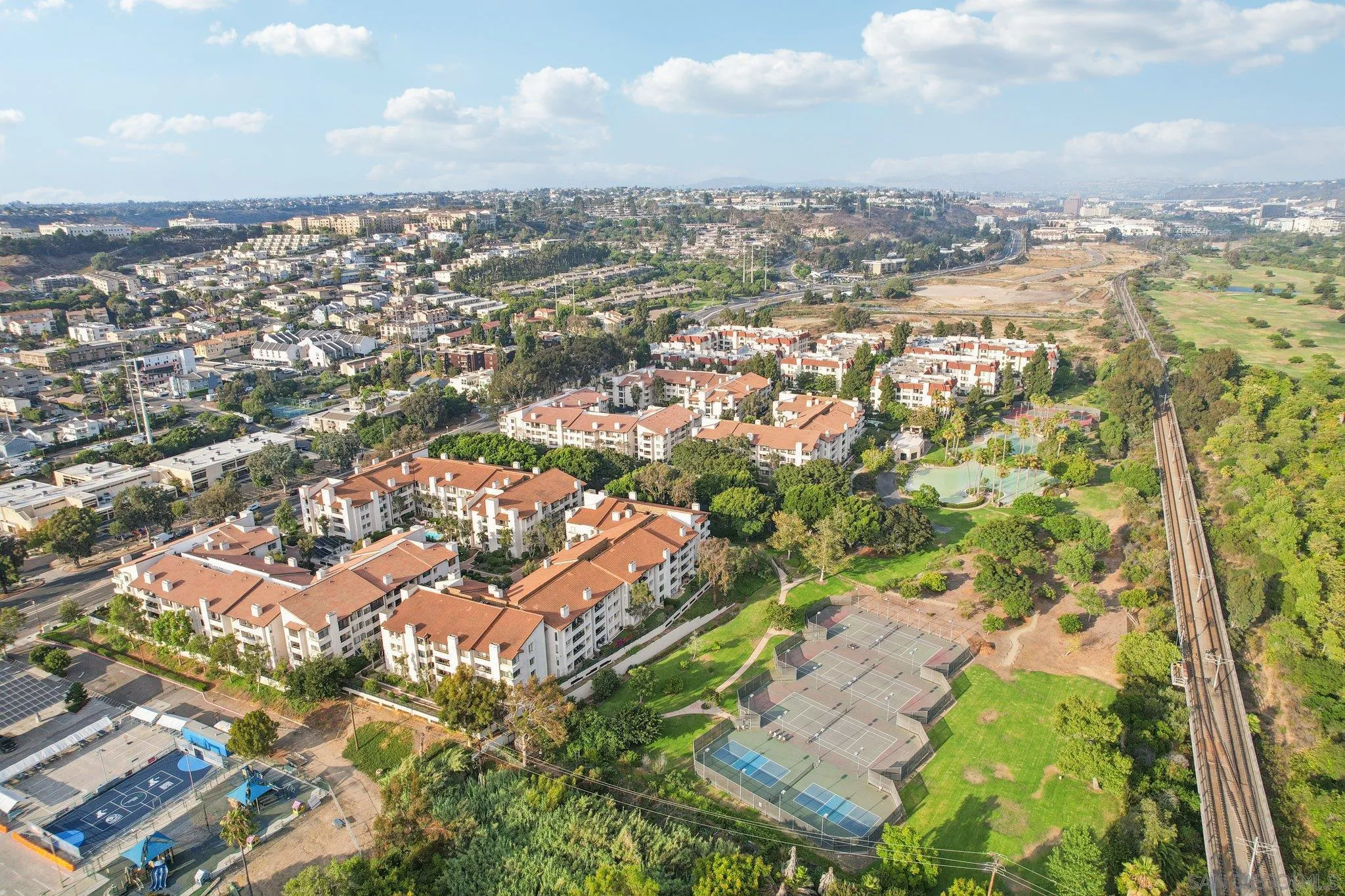 5645 Friars Road, Unit 386 San Diego, CA 92110 - Photo 41 of 45 an aerial view of residential building with yard