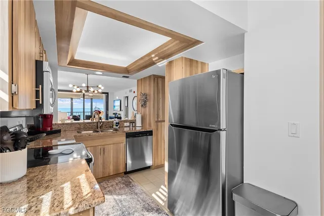 a kitchen with a stove and a microwave