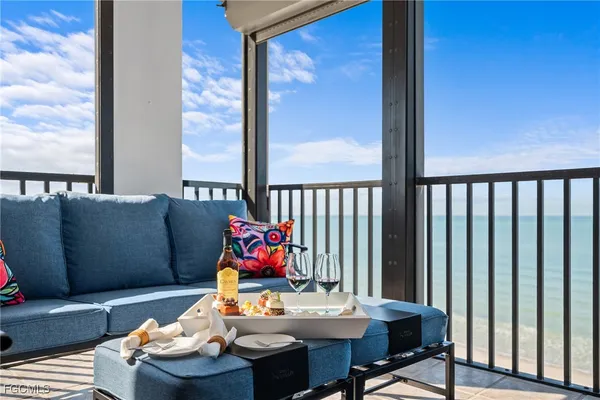 a view of a living room and wooden floor