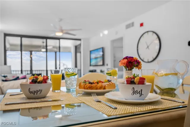 a room with a table and chairs