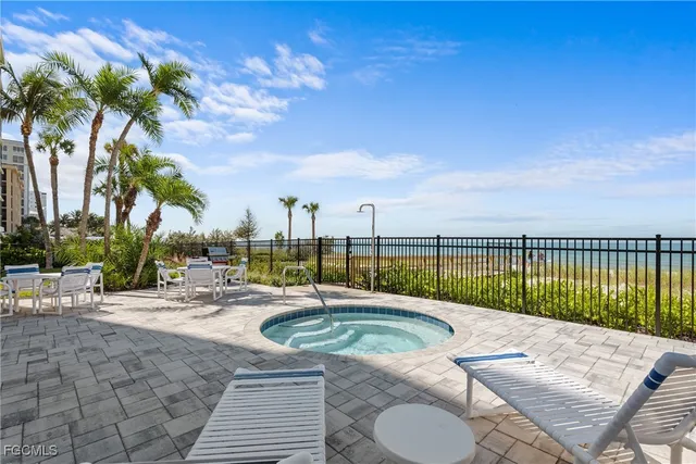 a view of a chairs with potted plants