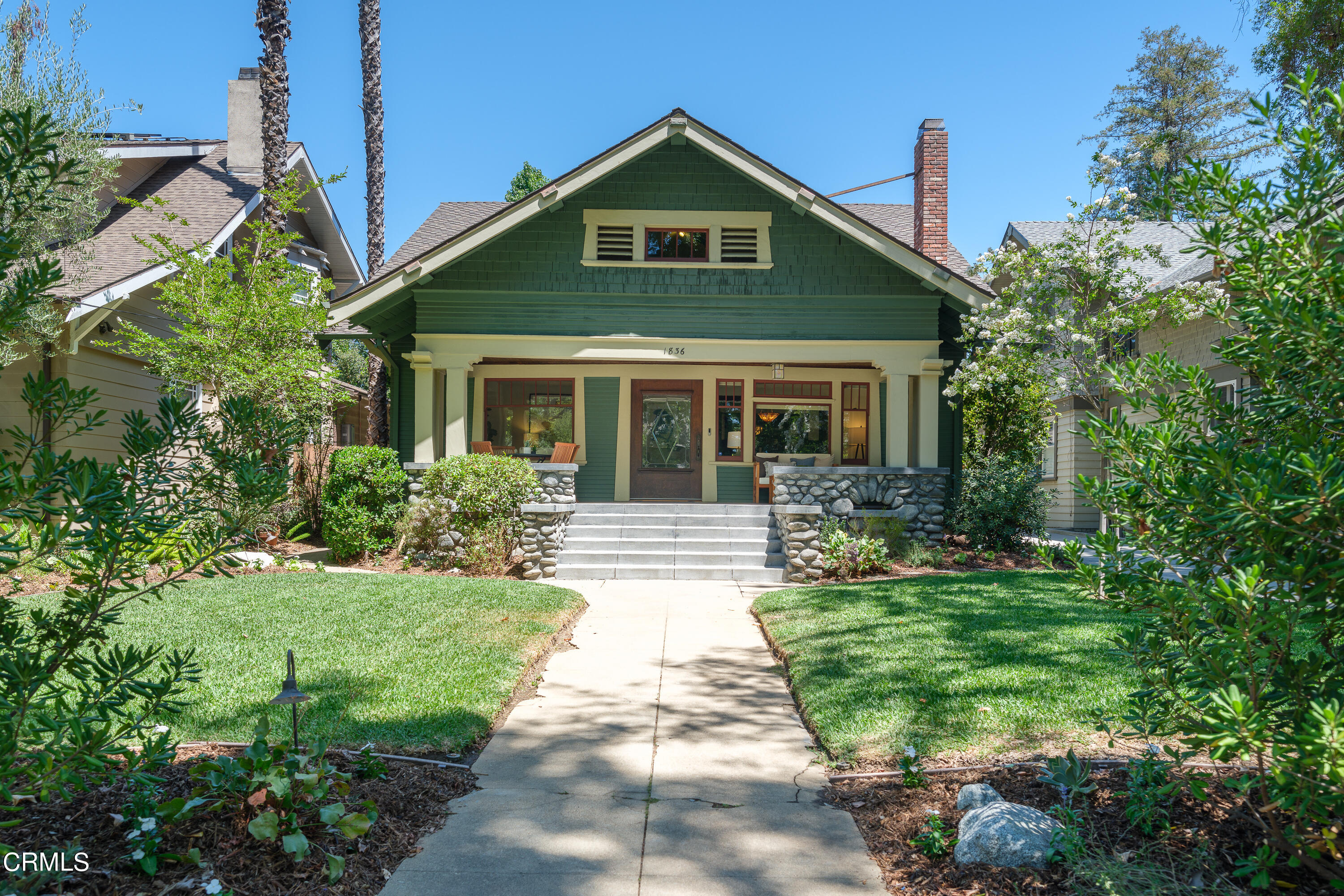 1836 Monterey Road South Pasadena, CA 91030 - Photo 1 of 24 a front view of a house with garden