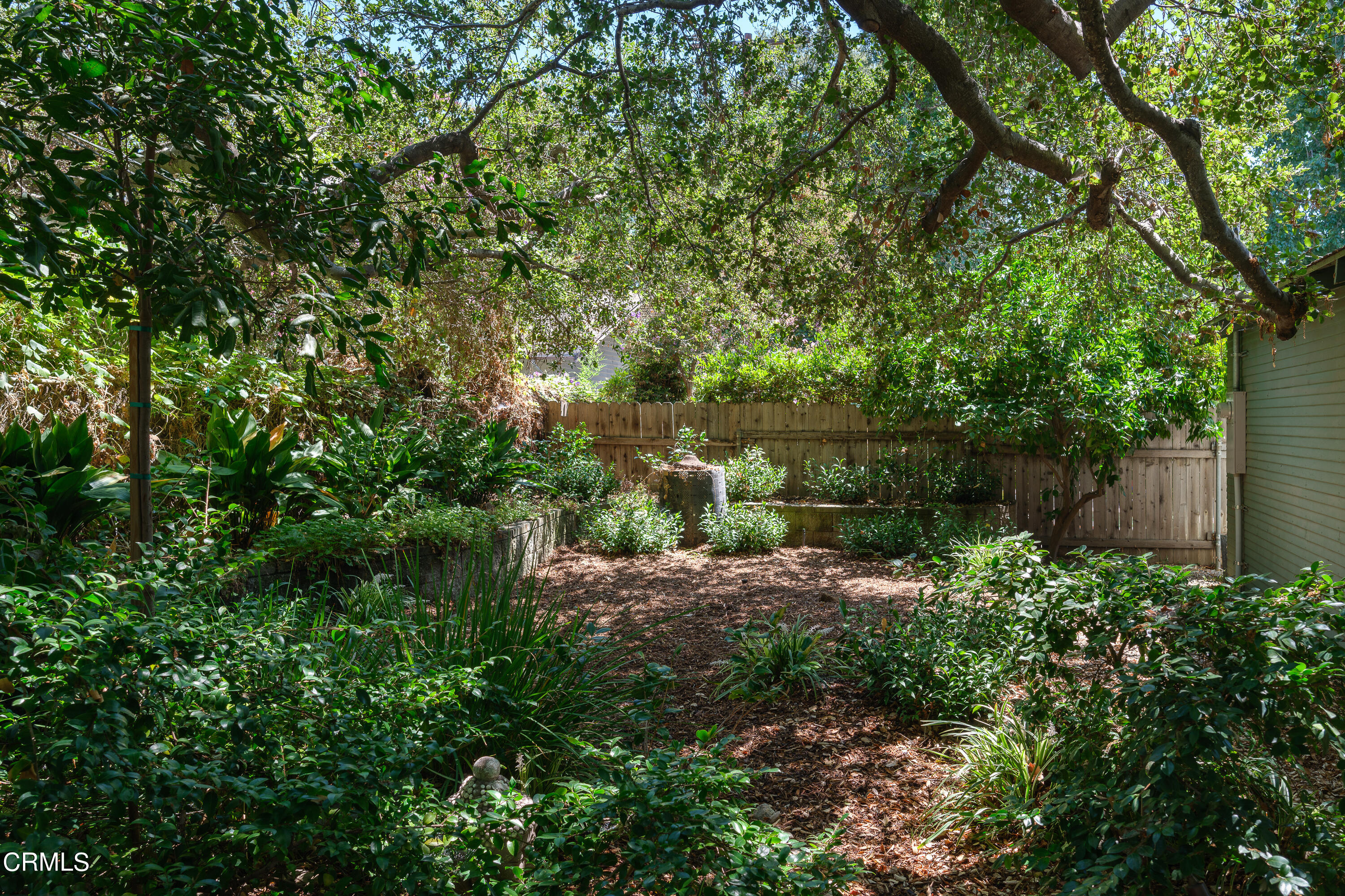 1836 Monterey Road South Pasadena, CA 91030 - Photo 21 of 24 a view of a garden with plants and large trees