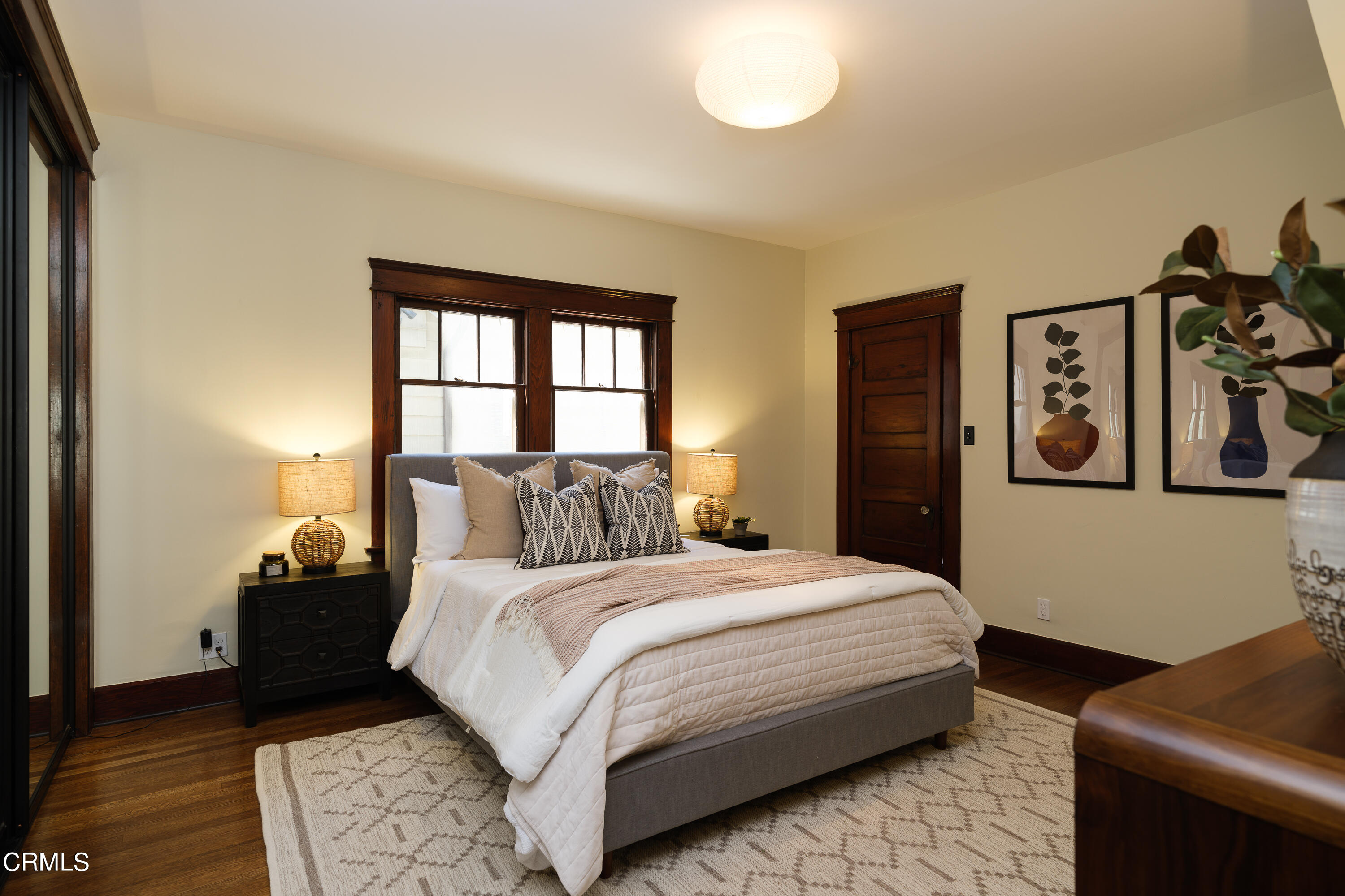 1836 Monterey Road South Pasadena, CA 91030 - Photo 9 of 24 a bedroom with a bed and wooden floor