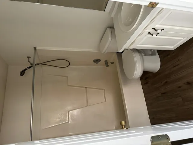 a bathroom with a sink and toilet