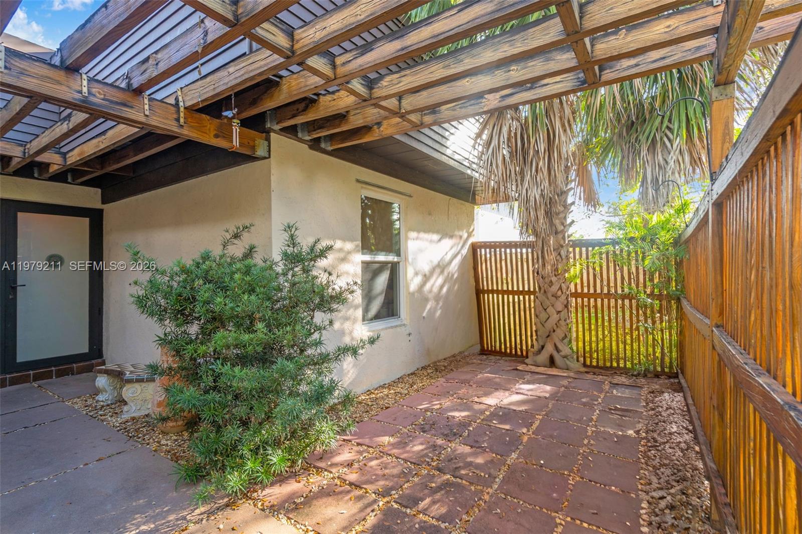 3785 Raleigh Street Hollywood, FL 33021 - Photo 2 of 36 a view of a porch