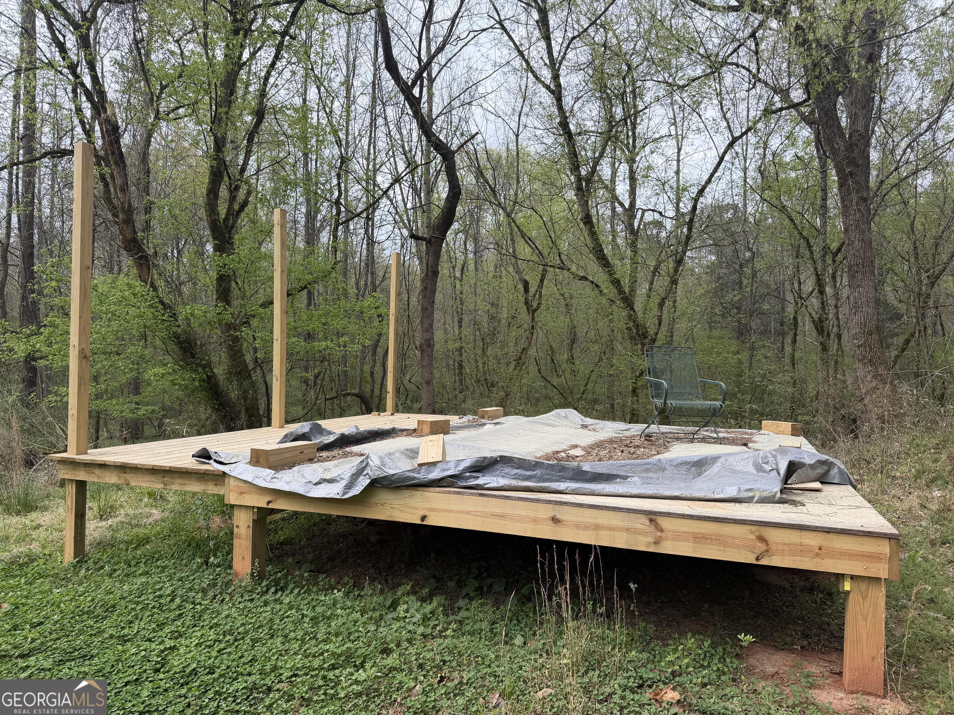 0 John Rucker Road Elberton, GA 30635 - Photo 60 of 76 a view of a wooden deck and lake view