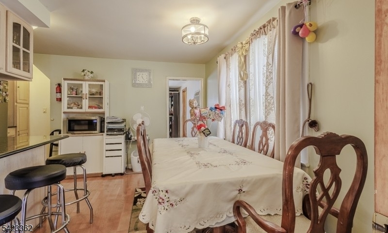 66 Garrison Street Newark, NJ 07105 - Photo 11 of 25 a view of a kitchen and dining room