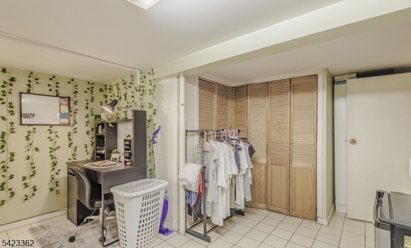 66 Garrison Street Newark, NJ 07105 - Photo 22 of 25 a view of a livingroom with storage space