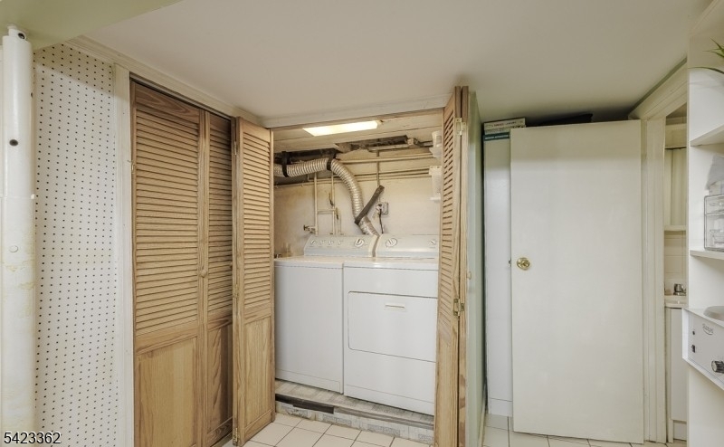 66 Garrison Street Newark, NJ 07105 - Photo 23 of 25 a bathroom with a shower and a sink