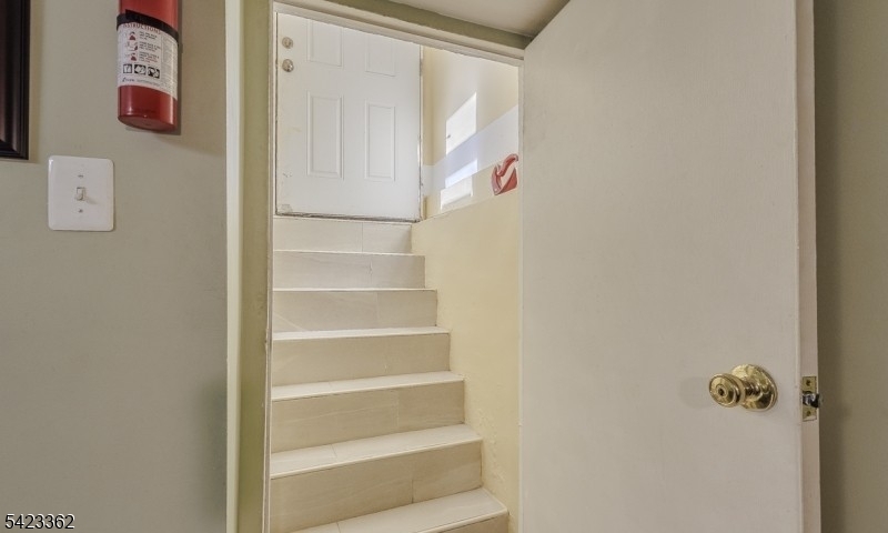66 Garrison Street Newark, NJ 07105 - Photo 25 of 25 a view of staircase with white walls