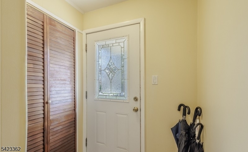 66 Garrison Street Newark, NJ 07105 - Photo 5 of 25 a view of a hallway with closet