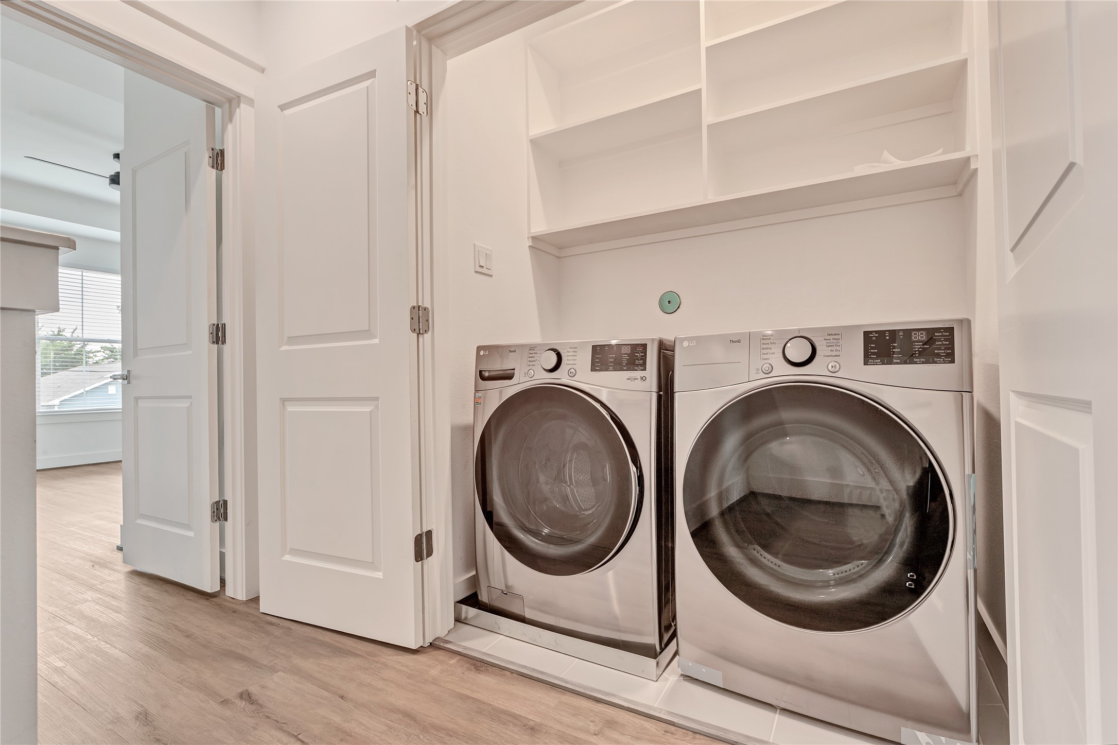 728 East 38th Street Houston, TX 77022 - Photo 10 of 18 Convenient second-floor utility area located near all bedrooms for added ease and functionality.