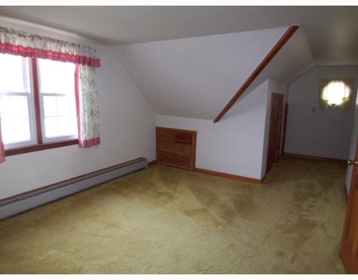 106 Fales Road Bristol, RI 02809 - Photo 7 of 11 Bedroom. Second Floor Bedroom 1 of 2 with built-ins and storage