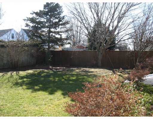106 Fales Road Bristol, RI 02809 - Photo 10 of 11 Yard/Garden. Backyard with mature plantings